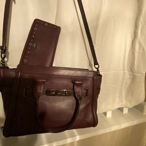 Burgundy coach purse, brand new/with matching wallet